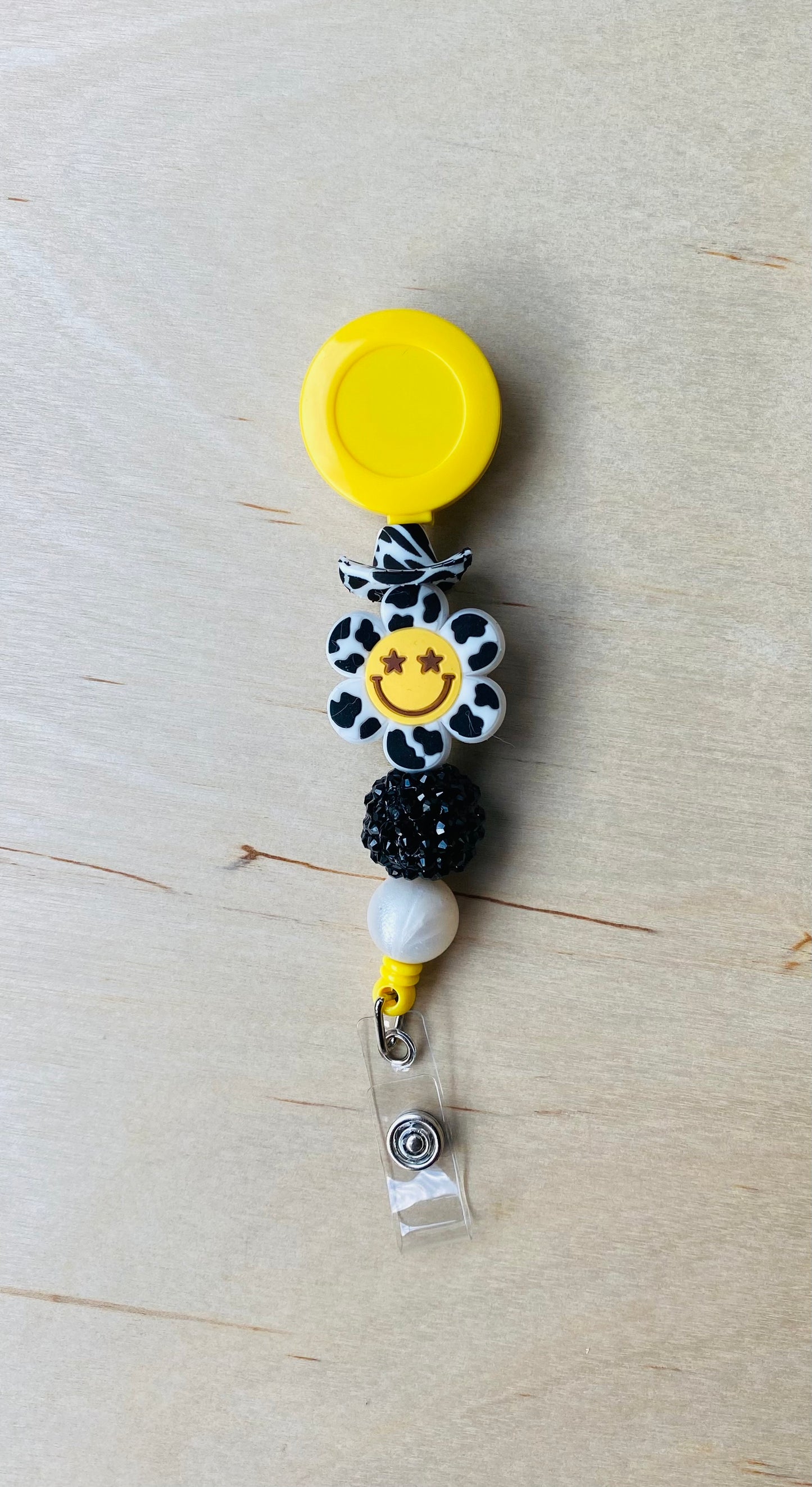Smiley Hat Badge Reel