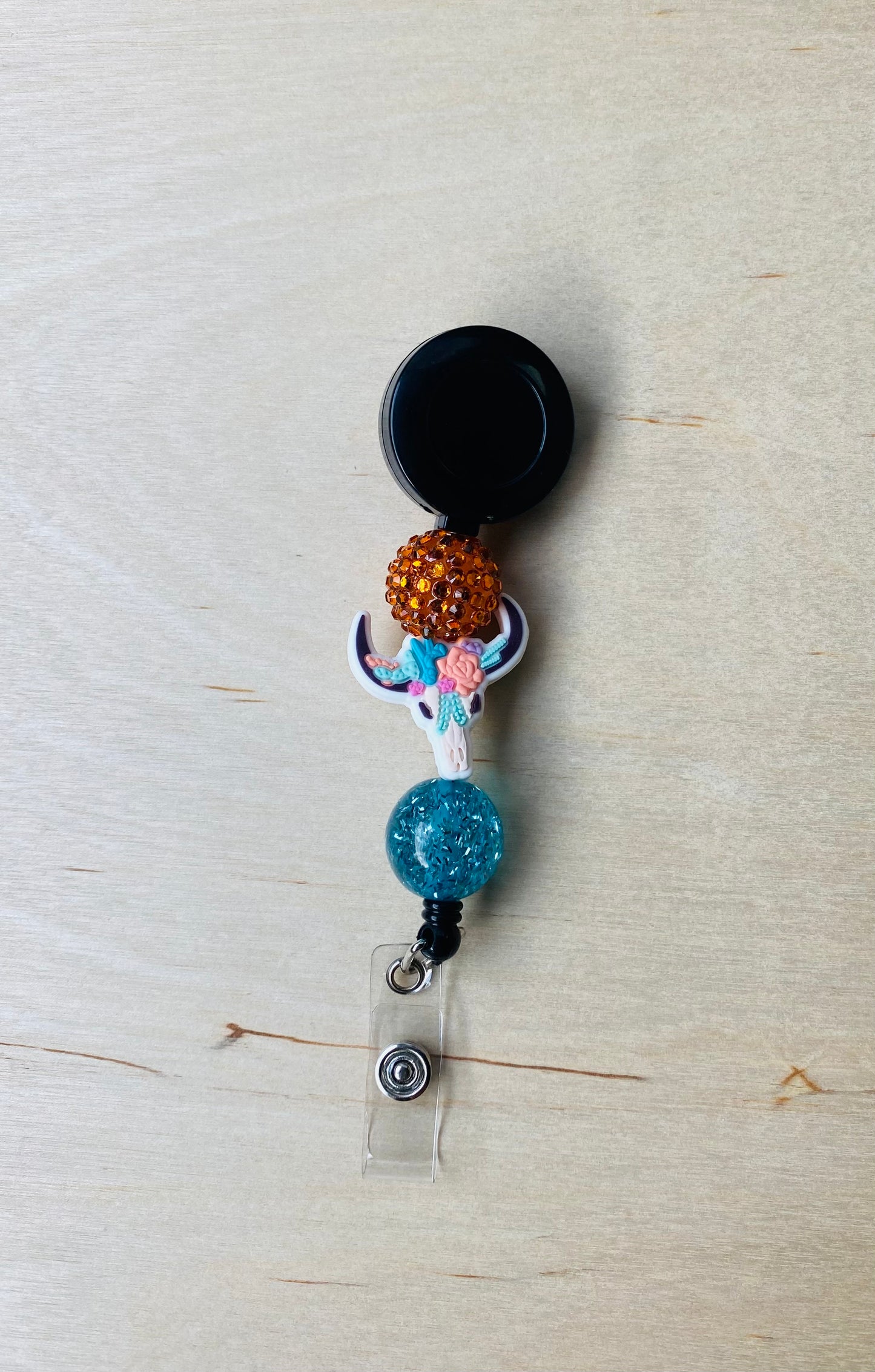 Floral Steer Badge Reel