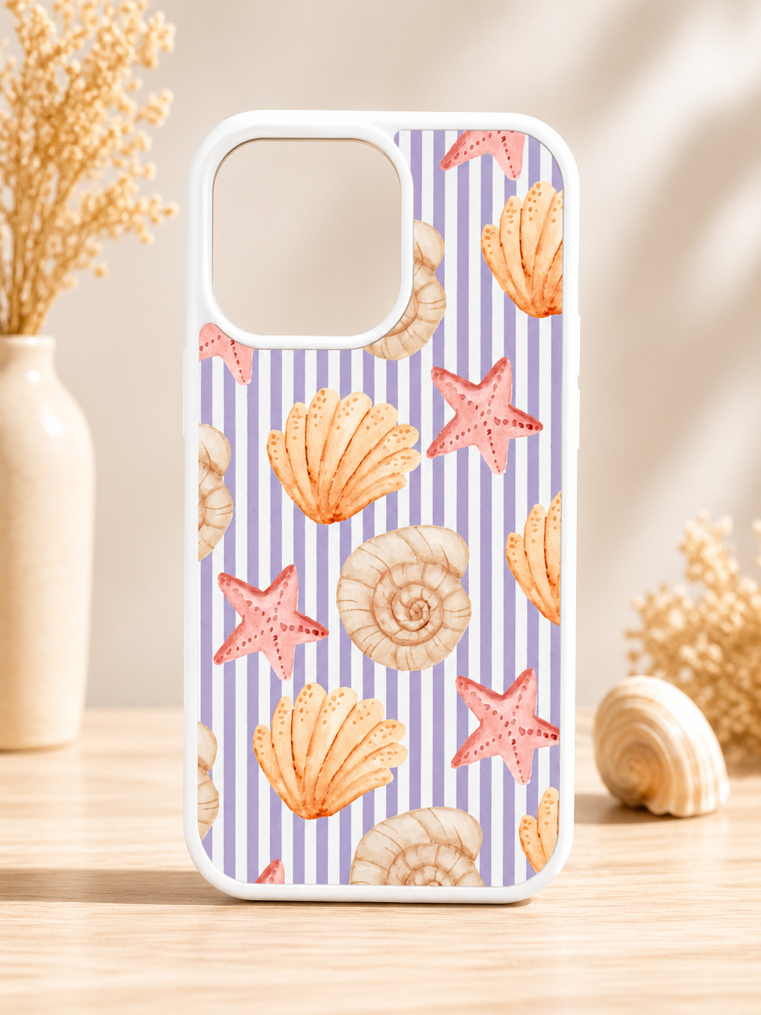 Coastal seashell phone case featuring beach shells and ocean-inspired design for iPhone and Samsung.