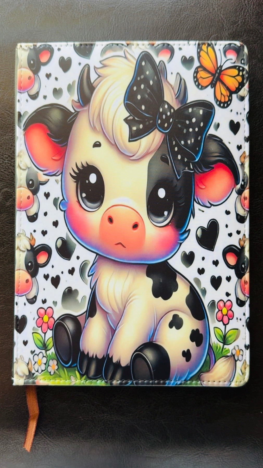 Cute baby cow reusable notebook with refillable journal insert.