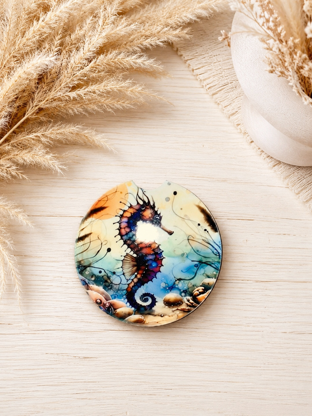 Colorful seahorse ceramic car coaster with blue aqua and coral coastal ocean design