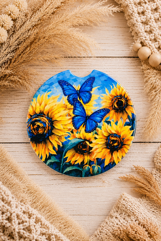 Sunflower and blue butterfly car coaster with vibrant yellow floral design by Chela Created.